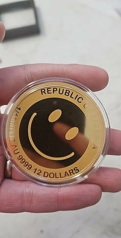 Smiley coin 1/1000 gold .9999  in card sleeve and box